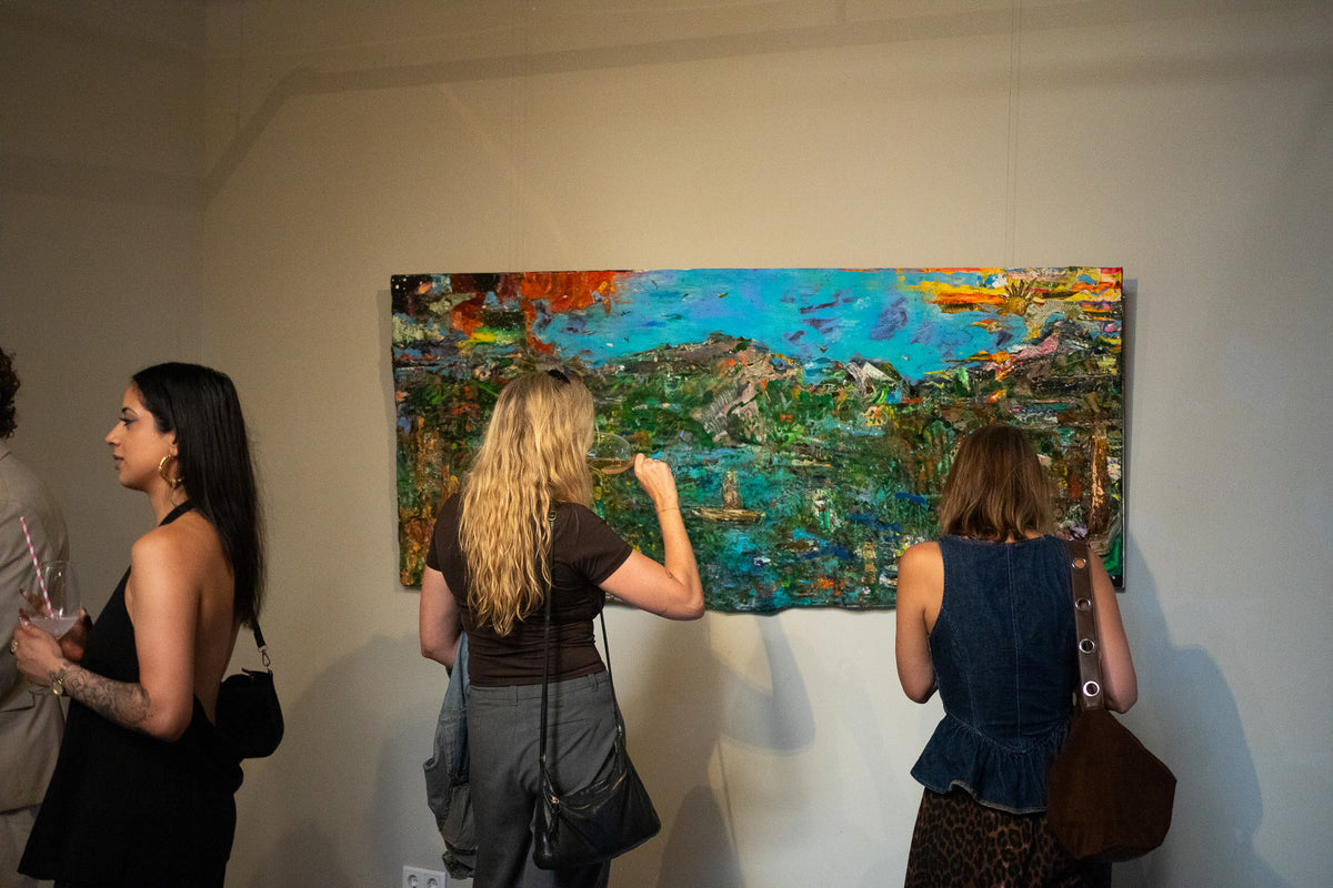 Visitors viewing artworks during Together in Spirit at UNKnowN Art Gallery
