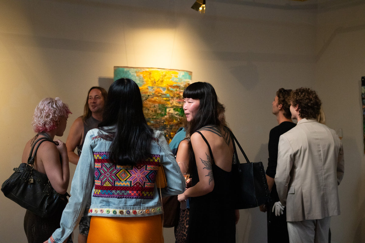 Visitors at the Together in Spirit exhibition at UNKnowN Art Gallery, Amsterdam